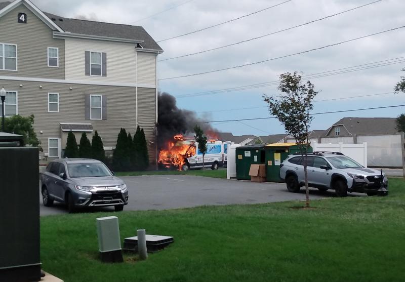 A van crashed into an apartment building and caught fire. PHOTO COURTESY OF CAROLINE WAUGH