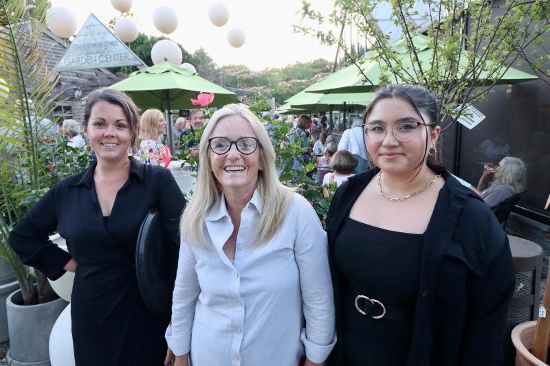 Leisa Berlin, owner of Station on Kings, middle, stands with two of her employees, Ashley Dimichele, left, and Andrea Wharton at the July 1 fundraiser. Berlin donated all proceeds from the event to the Fourth Street Preserve campaign.