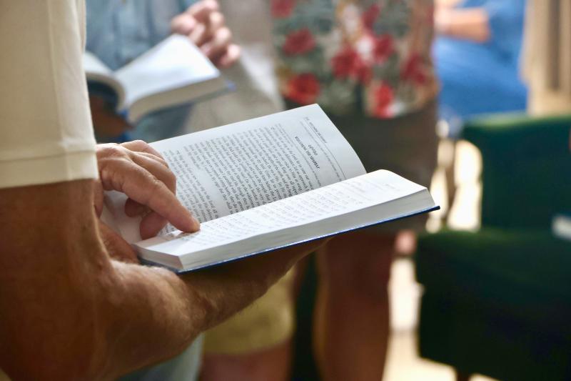 Welcoming the Shabbat by reading from the Torah.