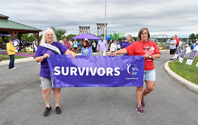 Leading the survivor walk are Linda Bosco, left, and Jeanne DiAmico.