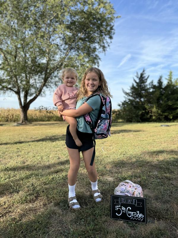 Milton Elementary fifth grader Annabelle McLaughlin holds her baby sister Penelope Pepper. REGINA MCLAUGHLIN_PEPPER PHOTO