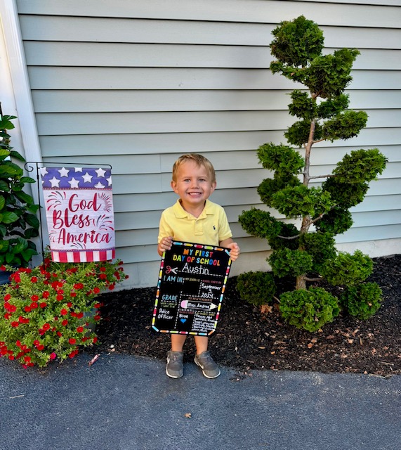 Austin Sander celebrates his first day at Lullaby Learning Center. ASHLEIGH SANDER PHOTO