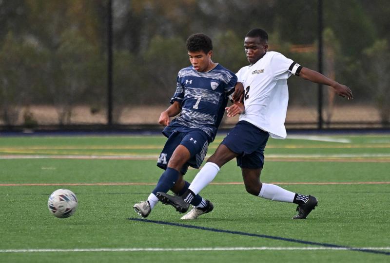 Sussex Academy senior Andres Romero-Nieto controls the ball from Seaford’s Christopher Marin Lopez.