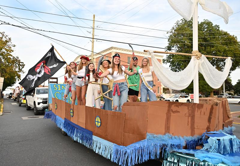 The sophomore float travels up Savannah Road to Legends Stadium.