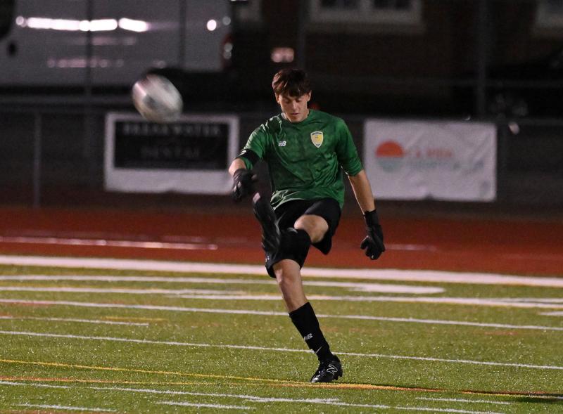 Cape keeper Jake Hutchison clears the ball after making a save.
