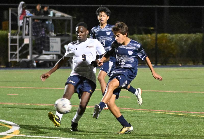 Sussex Academy’s Bodhi Williams makes a pass into the box.