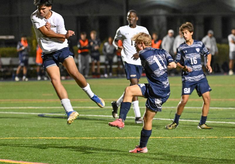 Noah Benz watches as his goal goes into the twine.