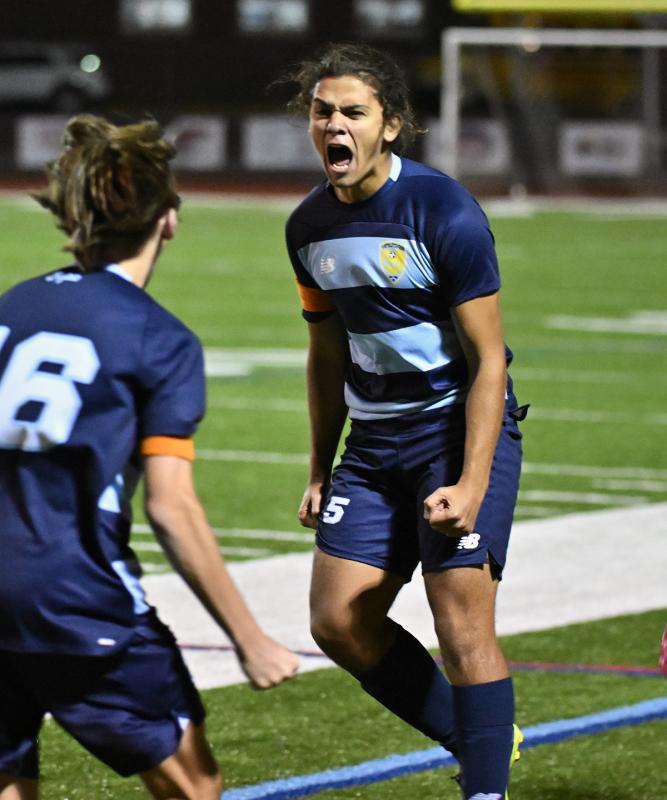 Cape junior Jorge Ruiz, right, celebrates with Cardin Benjamin.