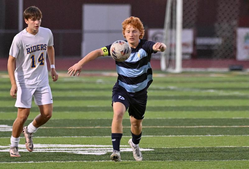 Cape’s Brandon Loucks speeds the ball away from CR’s Brody Hinkle.
