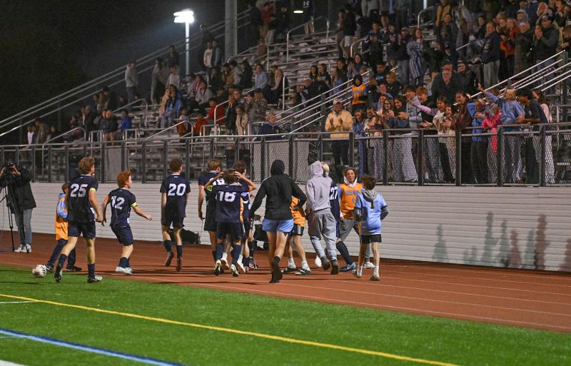 The Cape squad celebrates with the student section.
