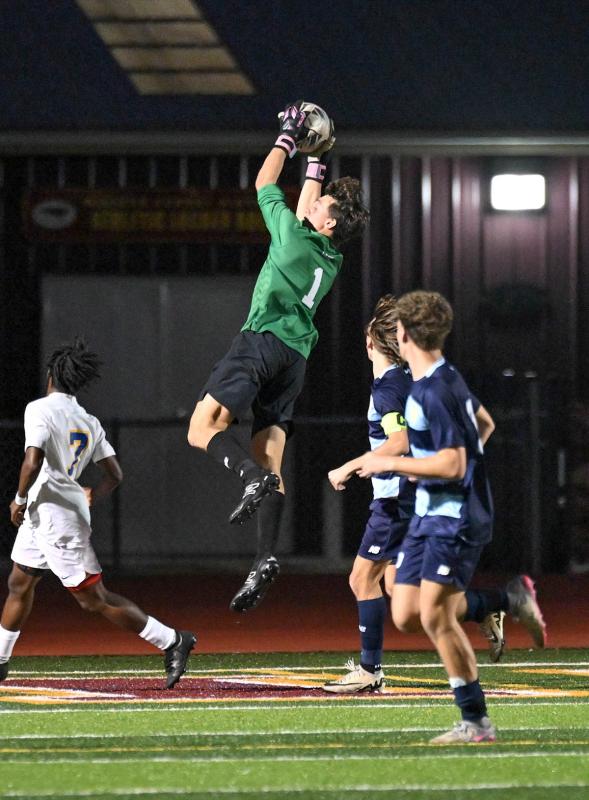 Cape senior goalie Jake Hutchison makes a save.