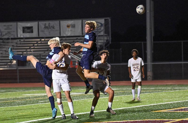 Cape senior Evan Burris took a Lawson Whaley 40-yard free kick and pushed it off his shoulder to score the winning goal for Cape. DAN COOK PHOTOS