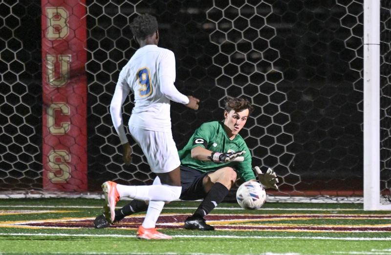 Cape senior goalie Jake Hutchison makes a play on CR’s Jamal Richards.