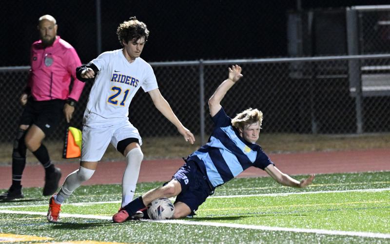 Cape’s Brady Spiegel gets taken out by CR’s Kane McDermott.