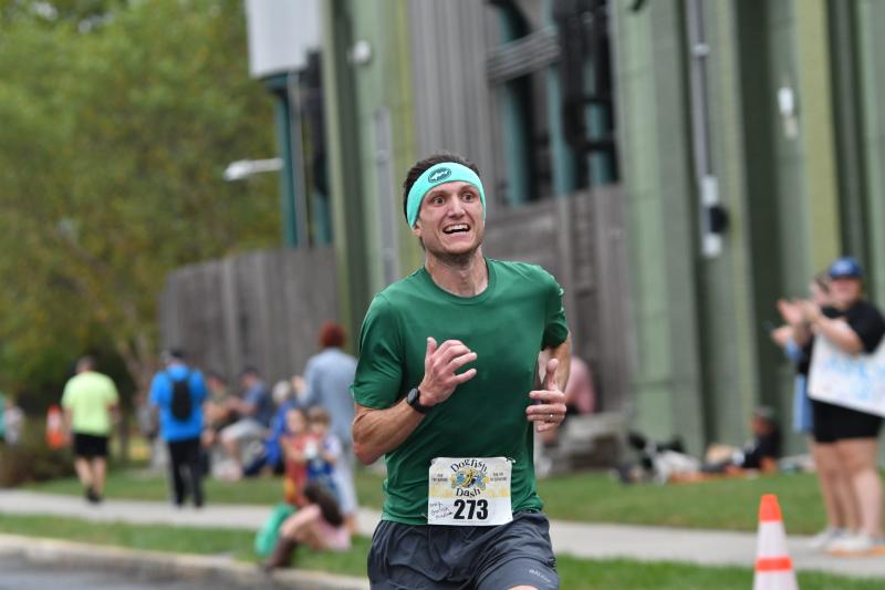 Andy Gorlich of Milton pushes to a third-place finish in a time of 22:56.
