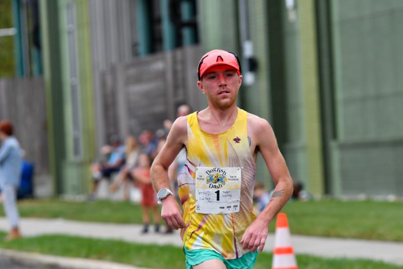Race winner Dylan Smiley cruises to the finish line after completing the 3.8-mile course in 20:05. DAVE FREDERICK PHOTOS