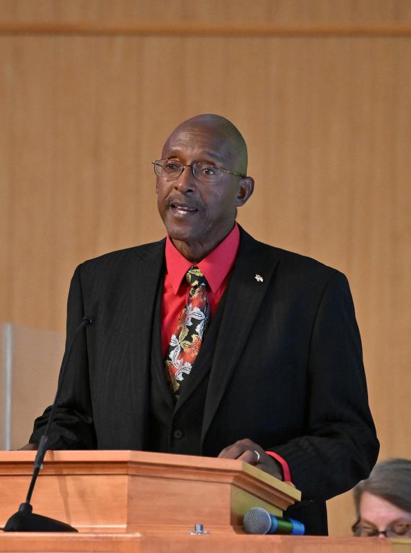 Ralph Gooch of Israel United Methodist Church in Lewes reads the scripture Ephesians 4:32.