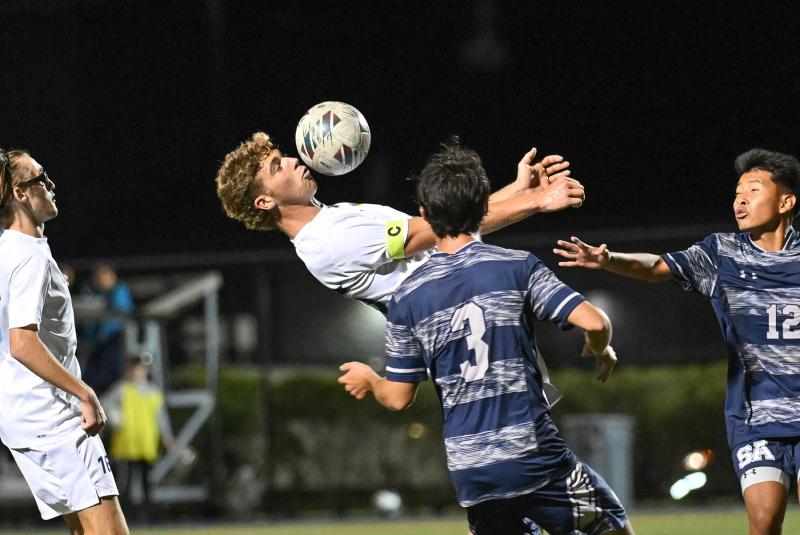 Cape senior Evan Burris keeps control of the ball with a face trap.