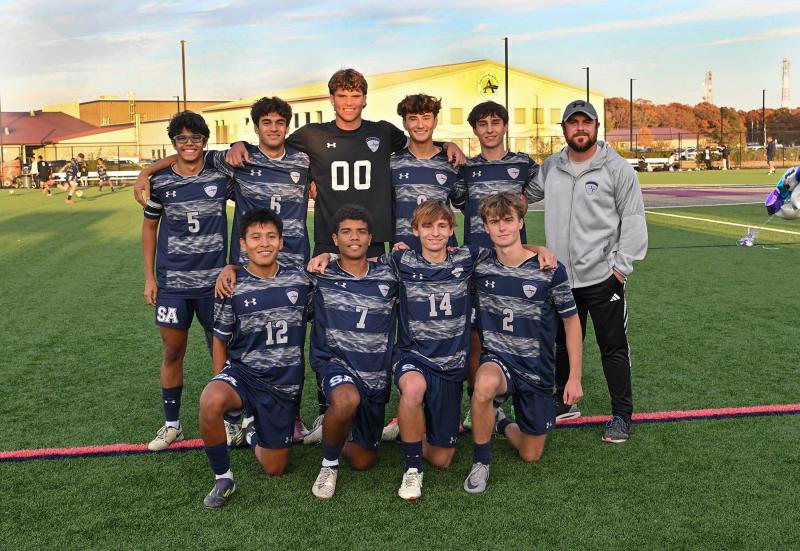 The Sussex Academy Class of 2025 for boys’ soccer comprises in back (l-r) Esteban Lara, Keenan Williams, CJ Norton, Aiden Villar, McKenna Danahy and head coach RJ Dina. In front are Richard Velasquez, Andres Romero, Alex Danilenko and Emerson Layton. DAN COOK PHOTOS