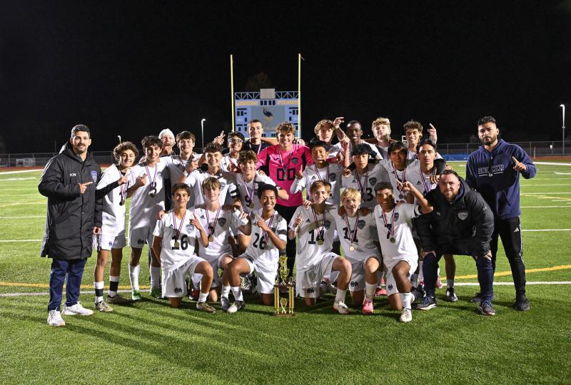 The Sussex Academy Seahawks defeated Cape 1-0 Nov. 2 to win the Henlopen Conference soccer crown. Shown are in back (l-r) coach Kyle Wheatley, Liam Stegall, McKenna Danahy, Tom O’Donnell, Ben Steimel, Aiden Villar, Esteban Lara, George Sapna, Austin Taylor, CJ Norton, Richie Velasquez-Perez, Carson Klahr, Ruendi Ortiz-Santos, Jesse Jean-Louis, Brandon James, Keenan Williams, Jose Figueroa and Arturo Mora Salas. In front are Bodhi Williams, Emerson Layton, Nate Falcone, Aleksander Danilenko, Noah Benz, Andres Romero-Nieto and head coach RJ Dina. DAN COOK PHOTOS