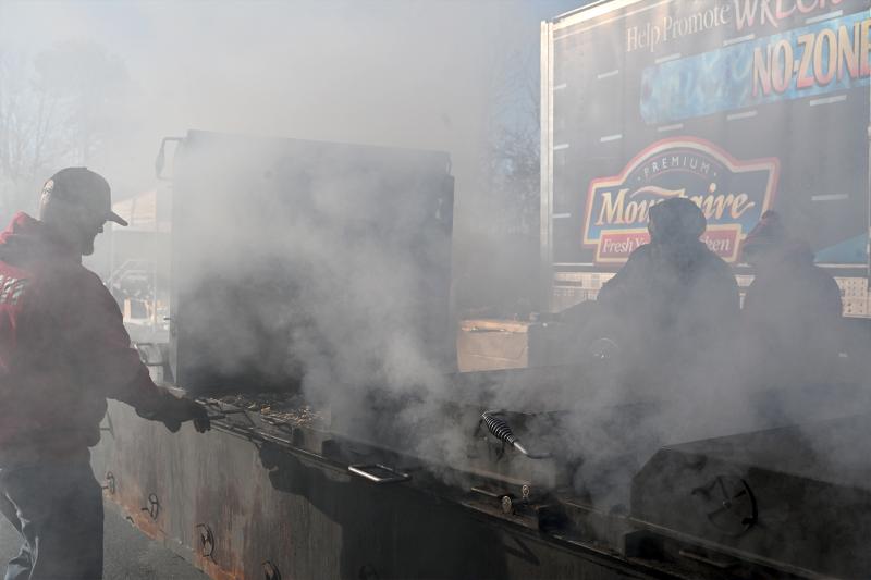 Barely visible through the savory smoke is David Galeone with Tangier Classic, who was volunteering his time to cook up some mouthwatering chicken.