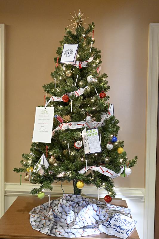 A golf-themed tree is sponsored by Delaware Hospice and decorated by Bob Burd in memory of Frank and Eleanor Soltner.