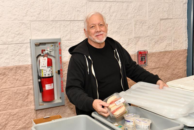 Gary Tronio is a veteran at volunteering at the food pantry.