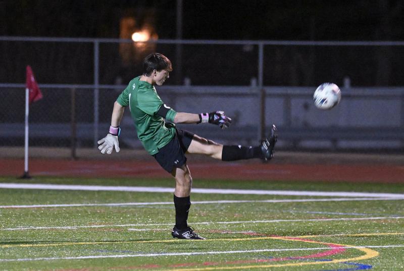 Cape keeper Jake Hutchison clears the ball after a save.