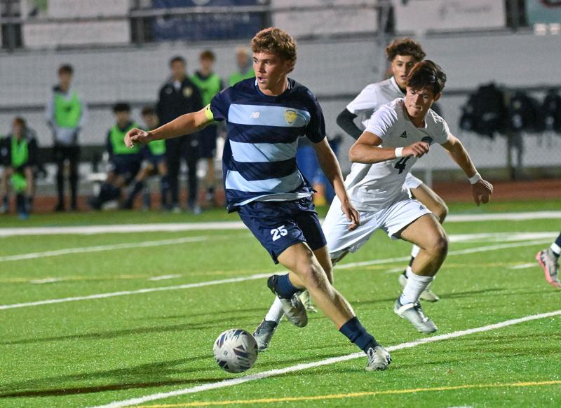 Cape senior Evan Burris controls play in the midfield.