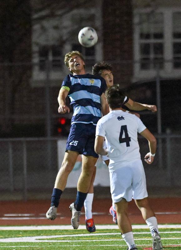 Cape senior Evan Burris gets the edge on a header.