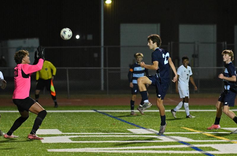 Cape’s Donnacha Hefferan blasts the ball past Sussex Academy keeper CJ Norton, but it hits the crossbar.