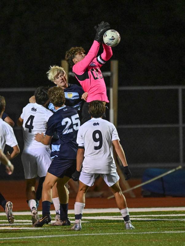 Seahawks senior goalie CJ Norton makes a save on a free kick.