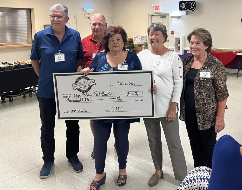 Cape Henlopen Food Basket check presentation attendees are (l-r) Food Italian-American Heritage Club of Sussex County members Peter Bosco, Gary Moyle, and Maria Diaferia, president; Paula Conti (who also volunteers at the food basket), and Tina Donofrio, treasurer. SUBMITTED PHOTO