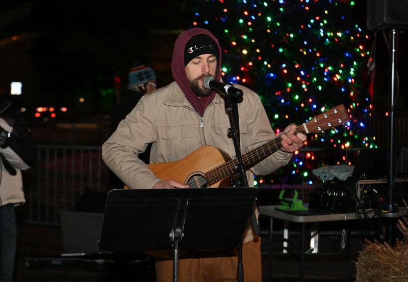 Aaron Routon played and sang Christmas songs.