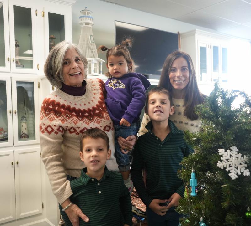 Smiling beside the evergreen they’re decorating at this year’s Trees of Cheer at the Beacon Inn in Lewes are in back (l-r), Susan DiMondi, Summer DiMondi and Sarah Richards. In front are Richards brothers Charlie, 6, and Max, 8. ELLEN MCINTYRE PHOTOS