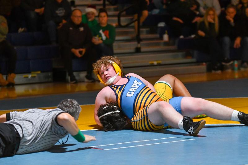 Fred Thomas Middle wrestler Charlie Gifford (225) gets a pin in the final seconds of his bout. DAVE FREDERICK PHOTOS