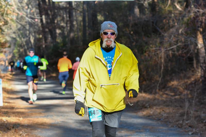 Chip Davis walks the half-marathon to honor the memory of Mary Bragg on her birthday.