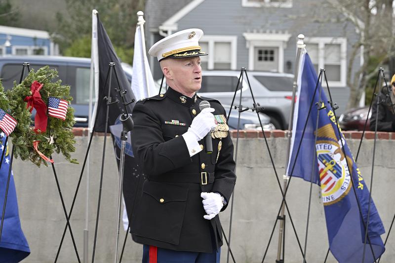 Col. Brian McGuire, Marine Corps (retired), speaks after delivering the Marine Corps’ ceremonial wreath.