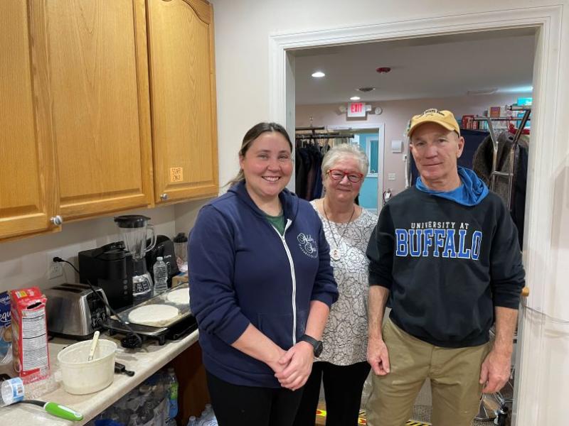 Cooking Christmas breakfast for the homeless men and women in their care at Community Resource Center are (l-r) Bethany Adkins, homeless shelter staff member; Becky Carney, volunteer; and Dave Galdun, staff member. SUBMITTED PHOTO