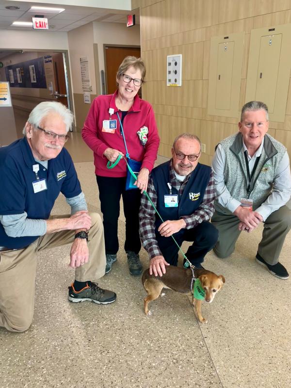 Many dedicated helpers came in during the storm to lend a hand to Team Beebe and patients in need. Shown are (l-r) volunteer John Miltner, volunteer Tina Maclary and therapy dog Peanut, volunteer Mitch Crane and Facilities Manager Glenn Mohring.