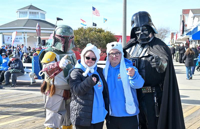 Athletes Rachel Rhea and Brian Perry say “May the force be with the Polar Bear Plunge.”