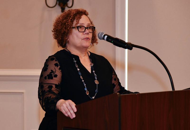 Sarah P. Jackson gives the invocation.