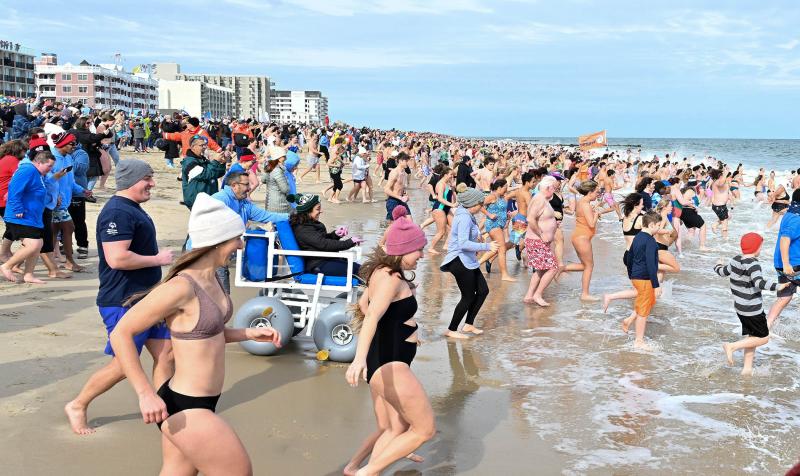More than 4,000 people fought off the chilly 37-degree water of the Atlantic Ocean to raise funds for the Special Olympics Delaware at the Lewes Polar Bear Plunge. DAN COOK PHOTOS