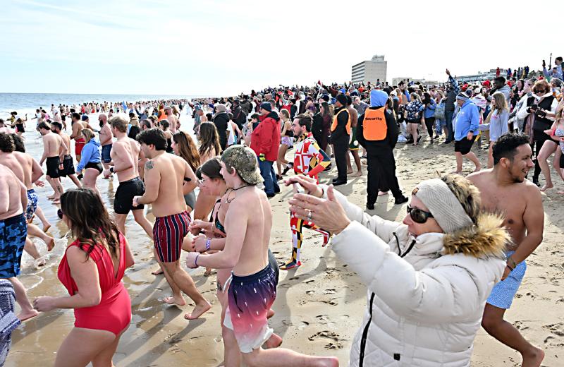 Over 4,400 polar bears rushed into the chilly water for the 2025 Polar Bear Plunge for Special Olympics.