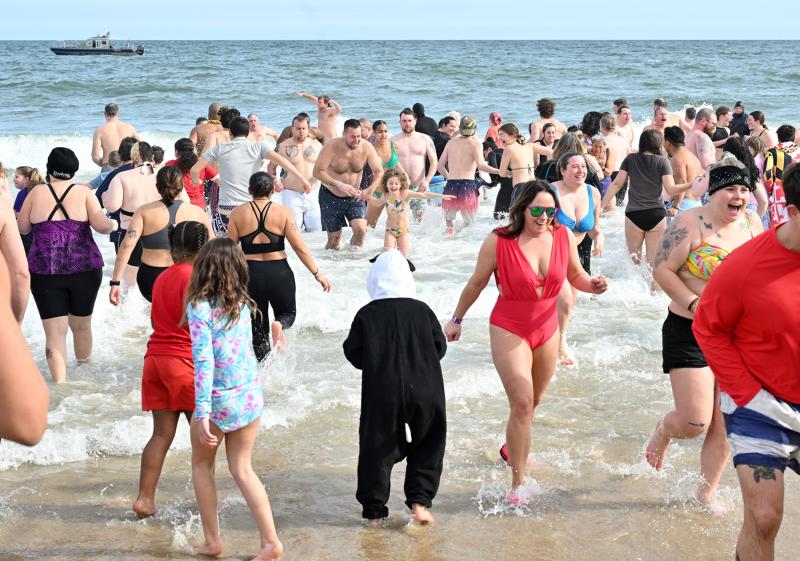 Polar Bears ran out of the chilly water as quickly as they ran in.