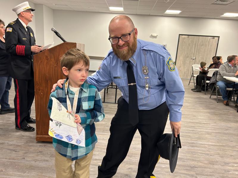 Accepting a first place-award with his father Chad is H.O. Brittingham second-grader Archer Wyatt. RYAN MAVITY PHOTOS