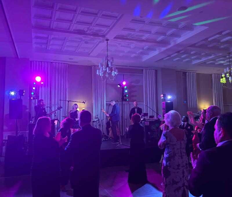 Guests dance along as Blue Label Band performs at the ball.
