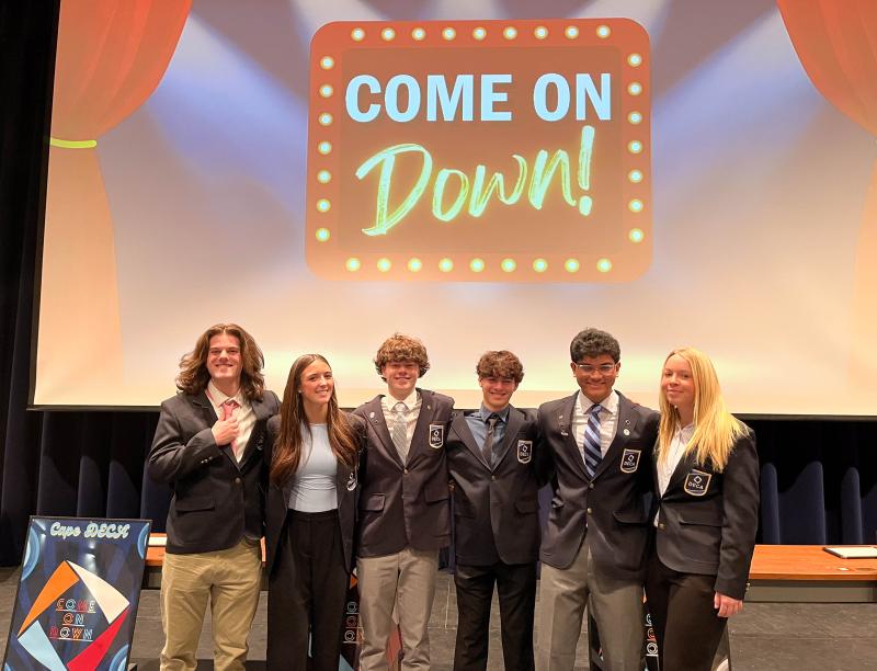 Cape DECA students (l-r) Gavin Rineer, Addie Breneman, Jack Flynn, Sully Naden, Krish Prattipati and Ellie Sprague helped to put together the Come on Down event Feb. 22 in the Cape auditorium. SUBMITTED PHOTOS