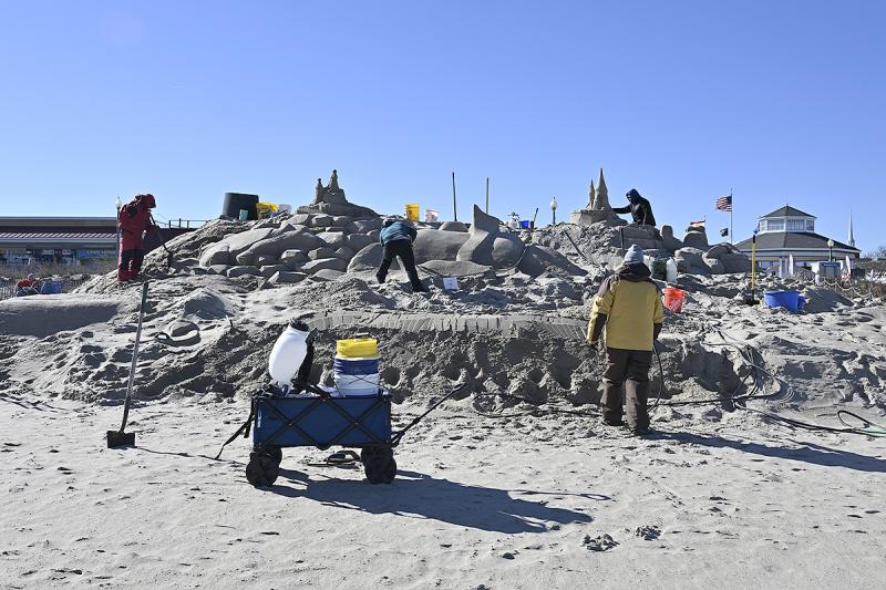 Andy West and his sand bears are focused on the task at hand.