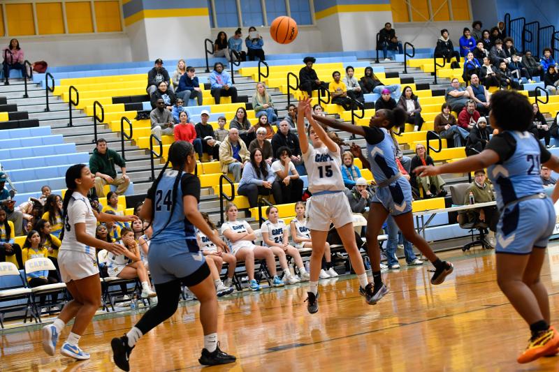 Elena Pereda-Garcia of Fred Thomas Middle takes a jumper. Elena is from Spain. DAVE FREDERICK PHOTOS